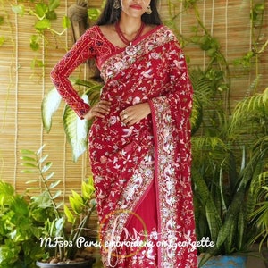 Beautiful Parsi embroidery saree on pure georgette .