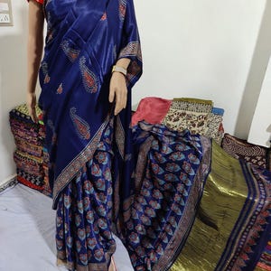 Modaal silk handblock ajrakh print saree with lagdi patta pallu