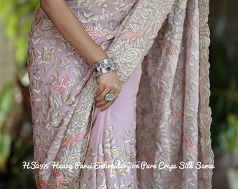 Pure crepe saree with Parsi embroidery.