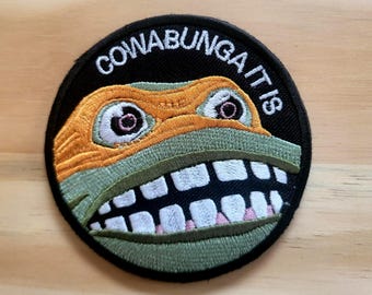 Parche táctico de moral de las Tortugas Ninja con cierre de velcro.