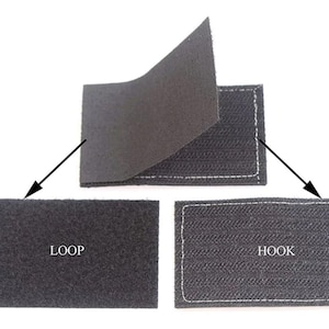 Puede incluir: Tres piezas de velcro negro. Una pieza est&aacute; etiquetada como "LOOP", otra como "HOOK", y la tercera muestra los dos lados unidos. Los bordes est&aacute;n cosidos con hilo blanco.