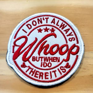 May include: A circular embroidered patch with a white background and red border. The text reads I DON'T ALWAYS in red, followed by three red stars, the word Whoop in large red script, and the text BUT WHEN I DO THERE IT IS in red.