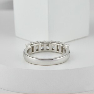 stunning Radiant Cut Lab Grown Diamond Half Eternity Band, designed for timeless beauty and ethical elegance. Featuring brilliant lab diamonds in a sleek half eternity setting, this ring shines with eco friendly craftsmanship and conflict-free luxury. Perfect as a diamond engagement ring, ethical wedding band, or meaningful anniversary gift for her.
