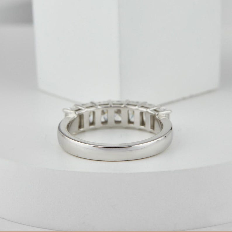 stunning Radiant Cut Lab Grown Diamond Half Eternity Band, designed for timeless beauty and ethical elegance. Featuring brilliant lab diamonds in a sleek half eternity setting, this ring shines with eco friendly craftsmanship and conflict-free luxury. Perfect as a diamond engagement ring, ethical wedding band, or meaningful anniversary gift for her.