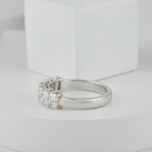 stunning Radiant Cut Lab Grown Diamond Half Eternity Band, designed for timeless beauty and ethical elegance. Featuring brilliant lab diamonds in a sleek half eternity setting, this ring shines with eco friendly craftsmanship and conflict-free luxury. Perfect as a diamond engagement ring, ethical wedding band, or meaningful anniversary gift for her.