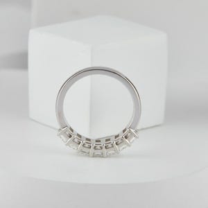 stunning Radiant Cut Lab Grown Diamond Half Eternity Band, designed for timeless beauty and ethical elegance. Featuring brilliant lab diamonds in a sleek half eternity setting, this ring shines with eco friendly craftsmanship and conflict-free luxury. Perfect as a diamond engagement ring, ethical wedding band, or meaningful anniversary gift for her.