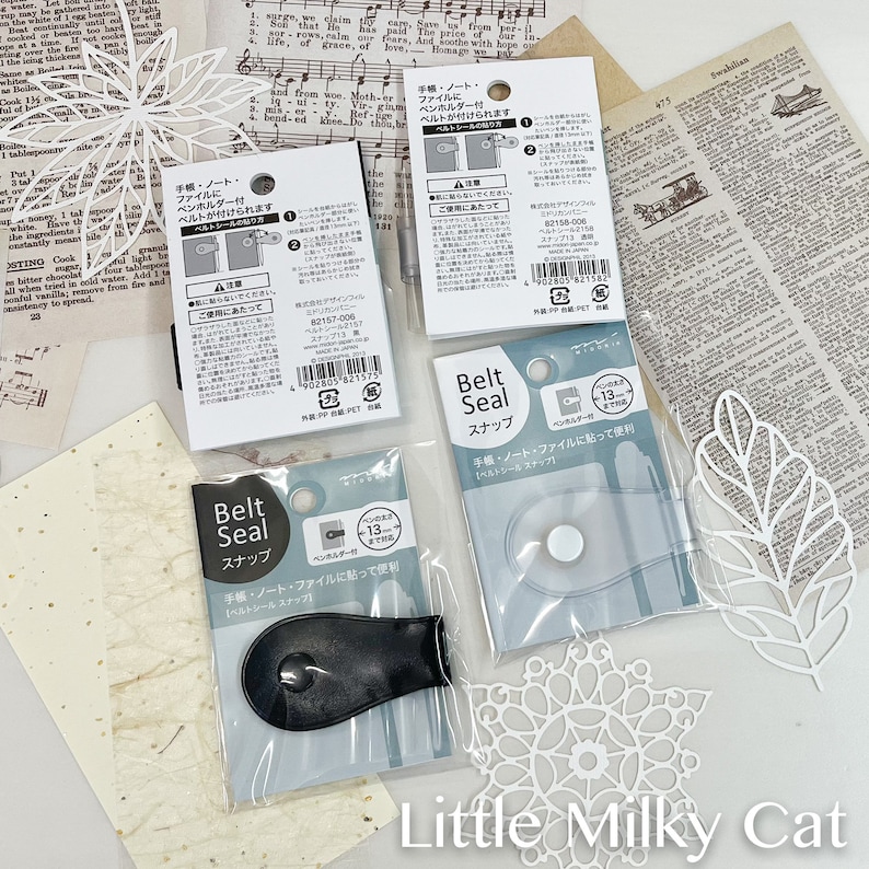 May include: Three clear plastic packages containing black and clear plastic belt seal snaps. The packages have Japanese text on them that reads "Belt Seal Snap" and "Handbook, notebook, and file, convenient to use".