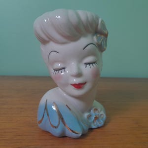 Gorgeous glamour girl style head vase in blue with gold detail