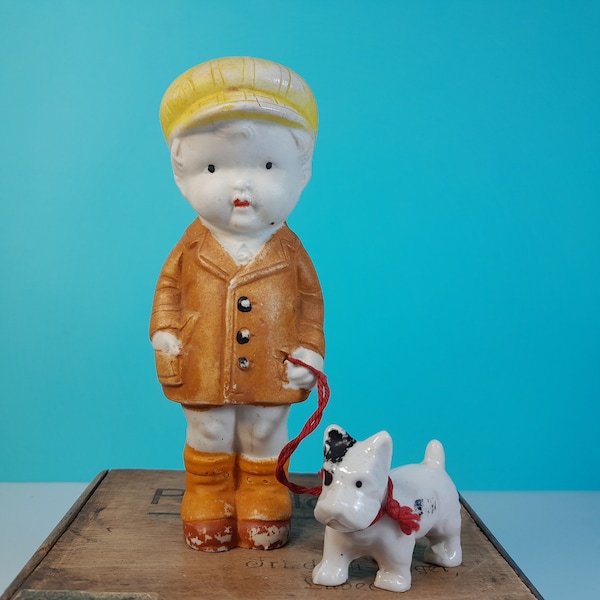 Vintage bisque boy doll wearing cap with little terrier dog on a lead, made in Japan, S832