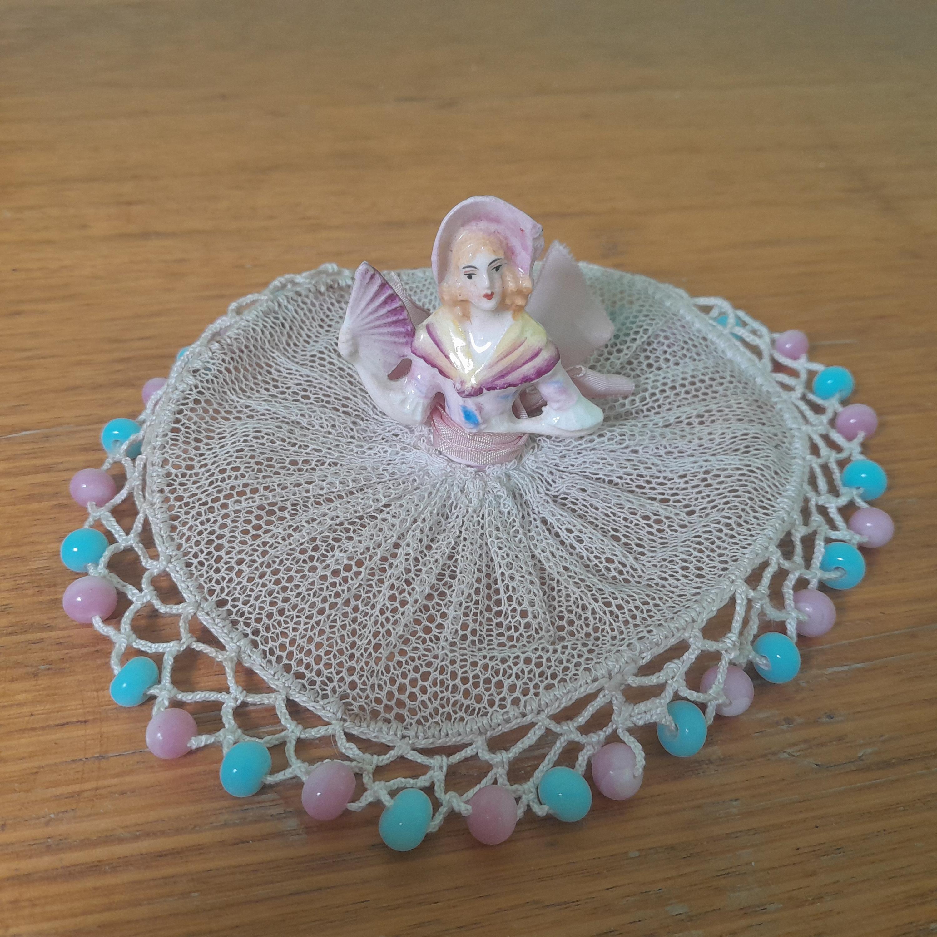 Vintage half doll milk jug cover