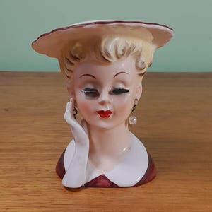 Small vintage lady head vase, eyelashes, faux pearl earrings, delicate hand and hat, 11cm
