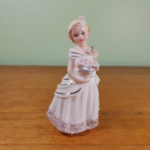 Vintage girl with flowers figurine, made in Japan