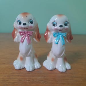 Super cute dog salt and pepper shakers with pink and blue bows, ceramic, made in Japan