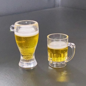2 pieces of miniature beer mug charms