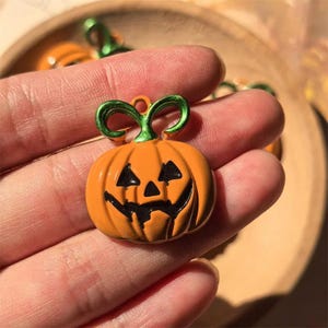 8 pcs of Halloween Pumpkin Charms, Jack O Lantern Resin Charms for Earrings, Necklaces, Keychains, Halloween Jewelry Crafts