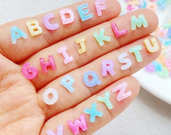 100 pcs of Pastel Glitter Resin Alphabet Charms, A-Z Flatback Letters for DIY Crafts, Kawaii Cabochons for Phone Case, Jewelry, Decoden Art