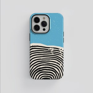May include: A blue and white phone case with a black and white striped design. The case has a camera lens cutout and a raised edge around the screen.
