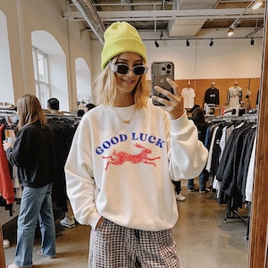 Good luck sweathirt. Lucky Rabbit sweater. Easy Tiger. Cool women's sweatshirt. Aesthetic sweaters. Cool girl sweaters. Retro western style.