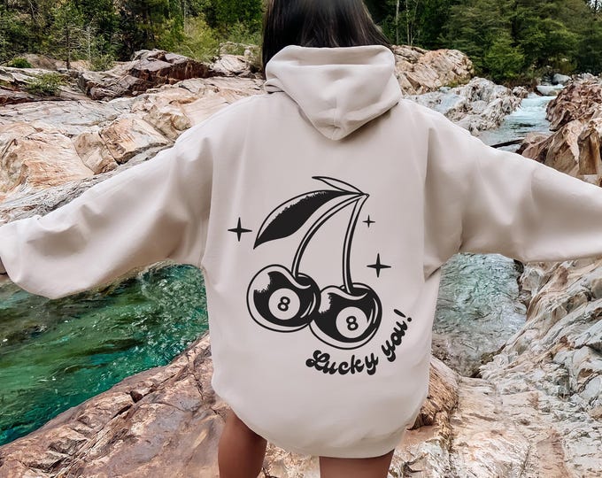 Lucky You Cherries Hoodie. Cool girl hoodie. Boho trendy aesthetic women's vintage cherries hoodie. Cherry 8 Ball Hoodie. Front and back.