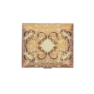 May include: A vintage gold and white metal compact with an intricate floral design.