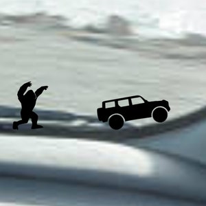 May include: A black silhouette of a Bigfoot or Sasquatch walking towards a black silhouette of a car. The image is on a white background.
