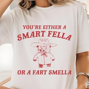 Are You A Smart Fella Or Fart Smella?, Retro Cartoon T Shirt, Weird T Shirt, Meme T Shirt, Trash Panda T Shirt, Unisex