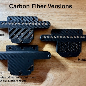 May include: Three black carbon fiber versions of a product with LED lights. The top version has a slash pattern, the middle version has a solid carbon fiber pattern, and the bottom version has a hexagon pattern. The text "Slashes", "Stealth", and "Hexagons" are visible below each version. The text "Carbon Fiber Versions" is at the top of the image.