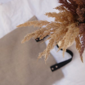 Stylish linen bag with rustic pampas grass