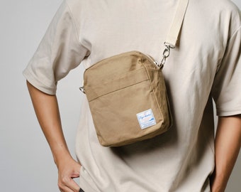 Small crossbody waxed canvas travel bag for men, extra durable lining with multiple easy access zipper pockets messenger Koala 208 in Khaki