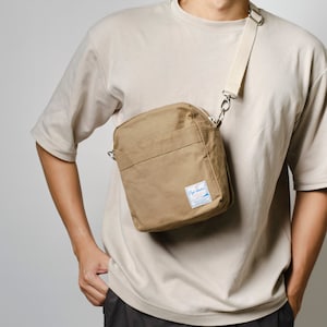 Small crossbody waxed canvas travel bag for men, extra durable lining with multiple easy access zipper pockets messenger Koala 208 in Khaki
