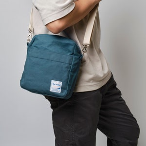 Mini bolso de viaje cruzado de lona encerada para unisex, mensajero de bolsillo con cremallera duradero con forro resistente al agua, Teal Koala 208 Teal