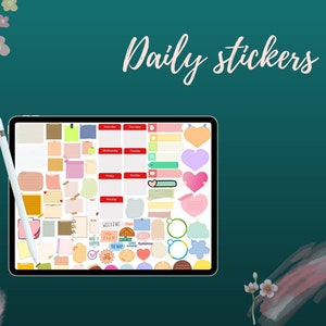 May include: A digital tablet displaying a variety of colorful stickers for daily planning. The stickers include hearts, stars, circles, and squares with different text and designs. The text on the stickers includes "Weekend", "Make it Happen", "To Do", and "Notes".