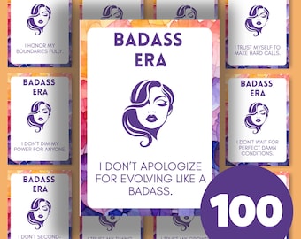 May include: A deck of 100 cards with the words "BADASS ERA" and empowering affirmations. Each card features a purple illustration of a woman's face. The cards are arranged on a colorful floral background.