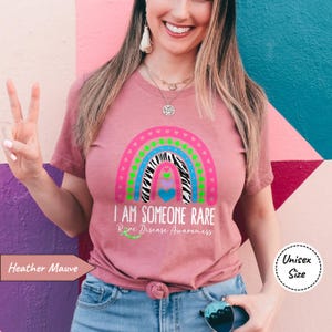 Rare Disease Awareness Shirt • I Am Someone Rare T-Shirt • Rare Disease Day Tshirt • Adult and Youth Size • Premium Soft Cotton Tee Heather Mauve