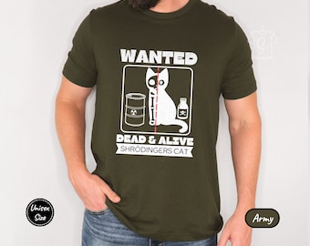 May include: A green t-shirt with a white graphic of a cat with a skull and crossbones. The text on the shirt reads "WANTED DEAD & ALIVE SCHRÖDINGER'S CAT".