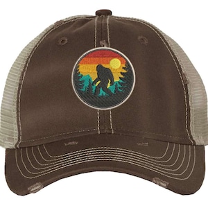 Bigfoot Mountain Sunset Distressed Trucker Hat | Cryptid Adventure Embroidered Mesh Back Cap