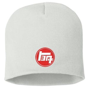 May include: A white knit beanie featuring a circular embroidered patch on the front. The patch has a red background with a white stylized logo that resembles the letters T, E, and M arranged in a geometric pattern within the red circle.