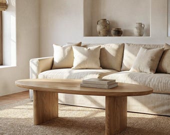 Massief eikenhouten salontafel. Ovale salontafel. Lage salontafel voor de woonkamer. Salontafel uit de LUMA-collectie.