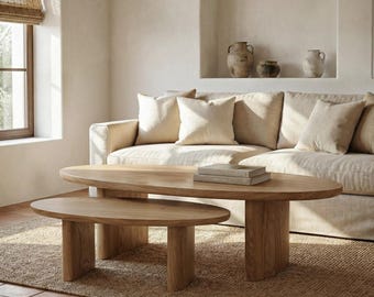 In elkaar schuifbare salontafels. Massief eikenhouten in elkaar schuifbare tafels. Ovale salontafels voor de woonkamer. Salontafel uit de LUMA-collectie.