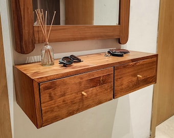 Zwevende houten consoletafel met lades. Geschikt voor de hal of als kaptafel.