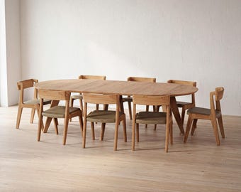 Table ronde extensible en chêne massif. Collection MODE