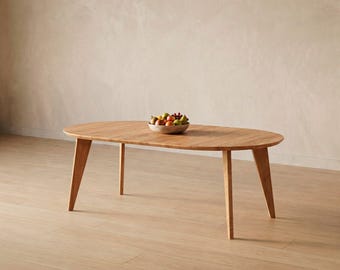 Table ronde extensible en chêne massif. Modèle NORMA