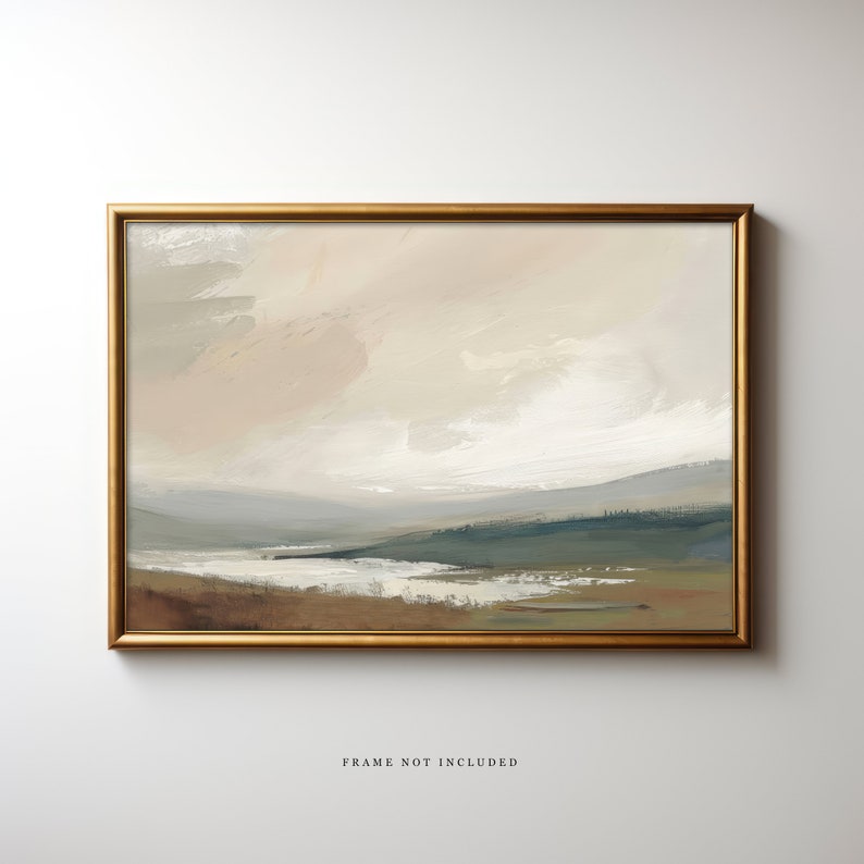 May include: A framed painting of a landscape with a light brown, gray, and blue color scheme. The painting depicts a body of water in the foreground, with hills and trees in the background. The sky is a light brown color with white clouds. The painting is framed in a gold frame. The text 'FRAME NOT INCLUDED' is printed below the painting.