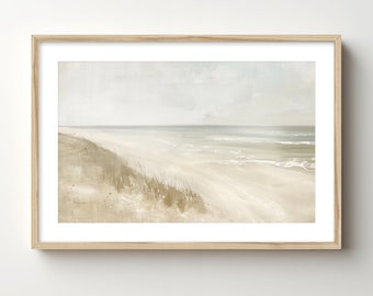 May include: A framed painting of a beach scene with a sandy shore, blue water, and a cloudy sky. The painting is in a light wood frame.