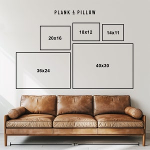 May include: A diagram showing different sizes of framed artwork above a brown leather sofa. The sizes are labeled in inches, with the largest being 40x30 inches and the smallest being 14x11 inches. The text "PLANK & PILLOW" is at the top of the diagram.