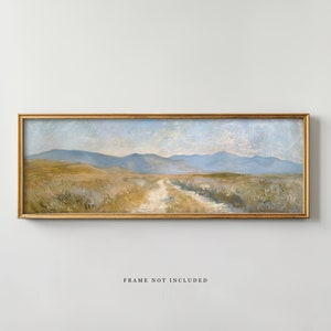 May include: A long, horizontal painting depicting a landscape with a dirt road leading through a field of tall grass towards a range of blue mountains in the distance. The sky is a light blue with white clouds.