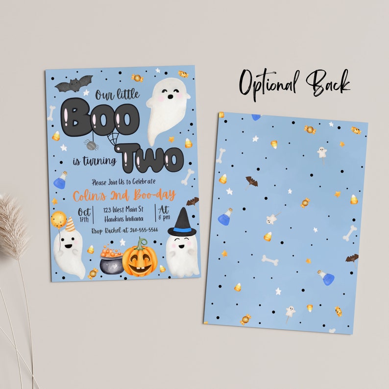 May include: A blue and white invitation card with a ghost and pumpkin illustration. The text on the card reads "Our little Boo is turning Two. Please join us to celebrate Colin's 2nd Boo-day. Oct 17th, 123 West Main St, Hawkins Indiana. RSVP Rachel at 210-555-5566. At 8 pm."