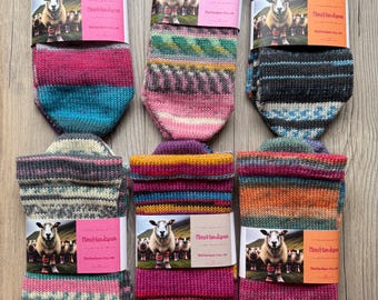 Hand cranked Cozy Wool/Nylon socks in various colors and sizes.