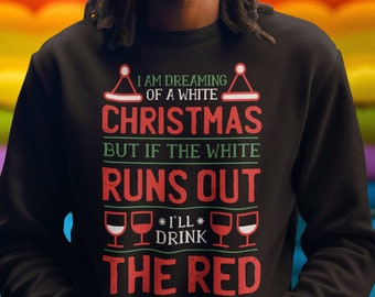 May include: A black sweatshirt with a white Christmas-themed graphic that reads "I am dreaming of a white Christmas but if the white runs out *I'll* drink the red".