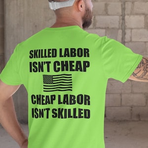 May include: A green t-shirt with the text "Skilled Labor Isn't Cheap" and "Cheap Labor Isn't Skilled" with an American flag graphic in between the text.